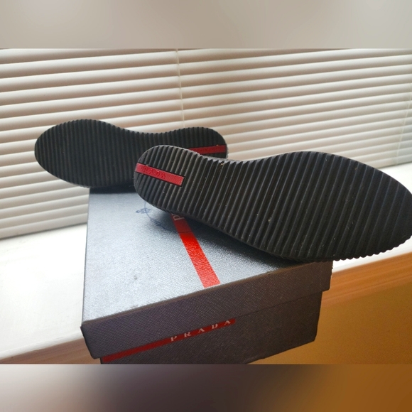 Gently loved Prada slip ons. Comes with dust bag and box. - Picture 2 of 4